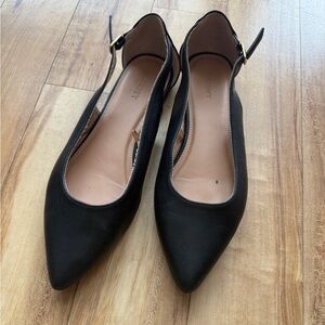 Black pointed toe flats
